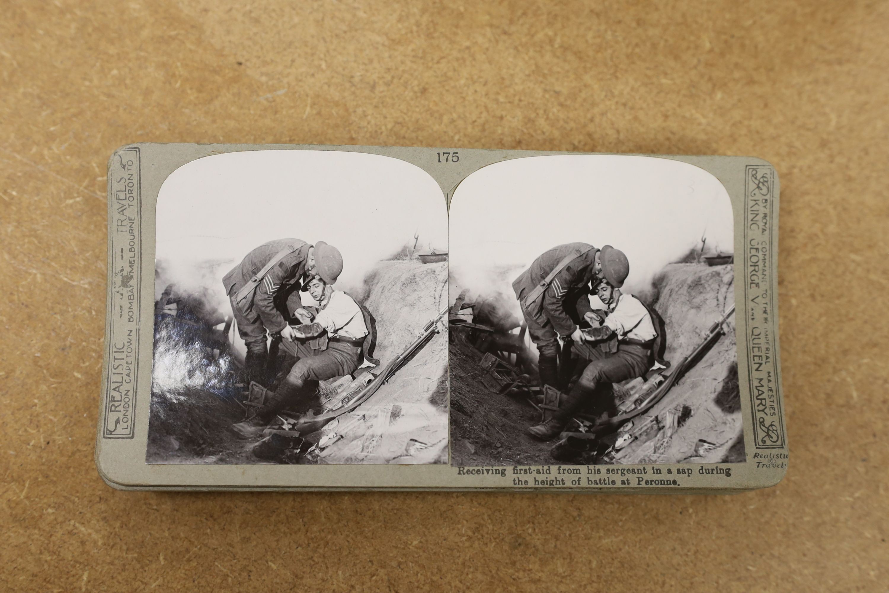 A set of The Great War stereoscopic slides, in case, and a viewer, 31 cms long.